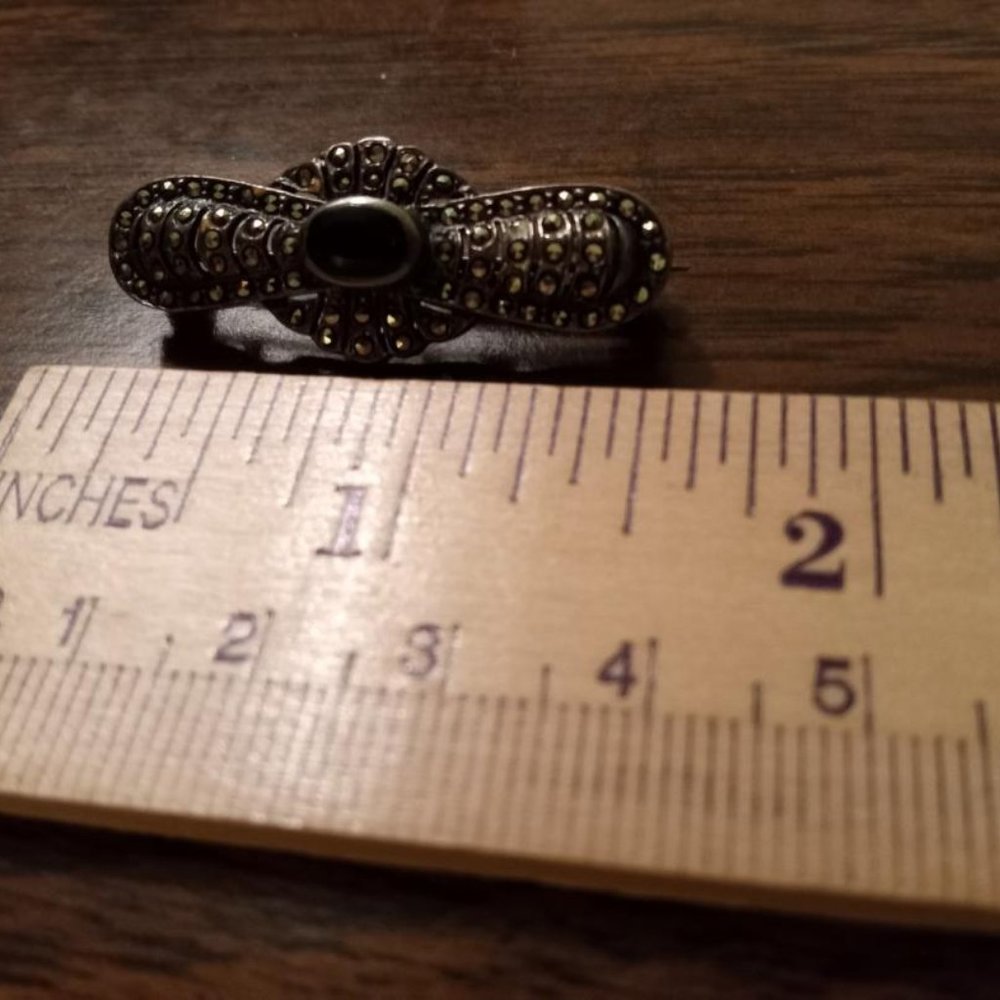 Onyx, marcasite and sterling silver pin